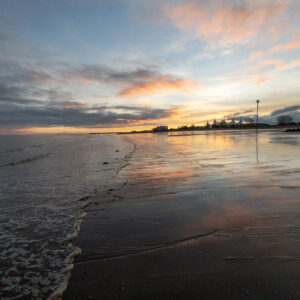 Sunrise Reflections on Minehead Beach