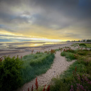 Dawn’s Whisper: Sunrise Over Minehead Beach