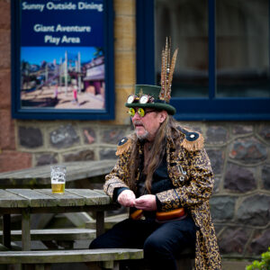 Steampunk Elegance: A Moment of Reflection at Minehead Festival